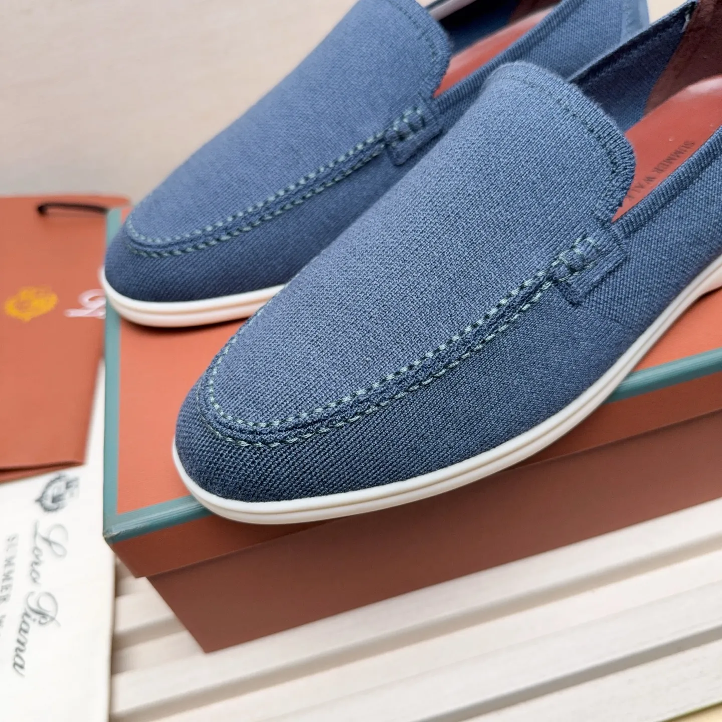 Men's Men's Shoes 💰400 Loro PIana moccasins are made of wish wool fabric. The upper is made of knitted fabric, made on a loom, and then attached to a rubber sole. The Rain System's water-repellent treatment enhances the shoe's functional design, while the suede details give the shoe a sense of elegance and sophistication. Made from Wish, fine wool from Australian and New Zealand Merino sheep